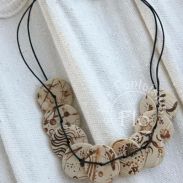 Collier palets en faux os